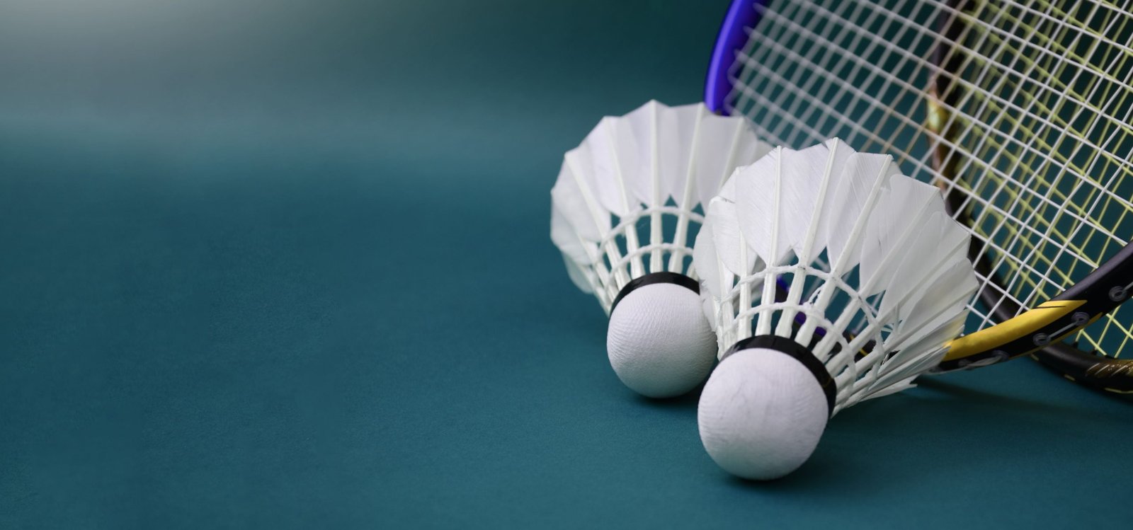 vecteezy-cream-white-badminton-shuttlecock-and-racket-with-neon-light-6614441